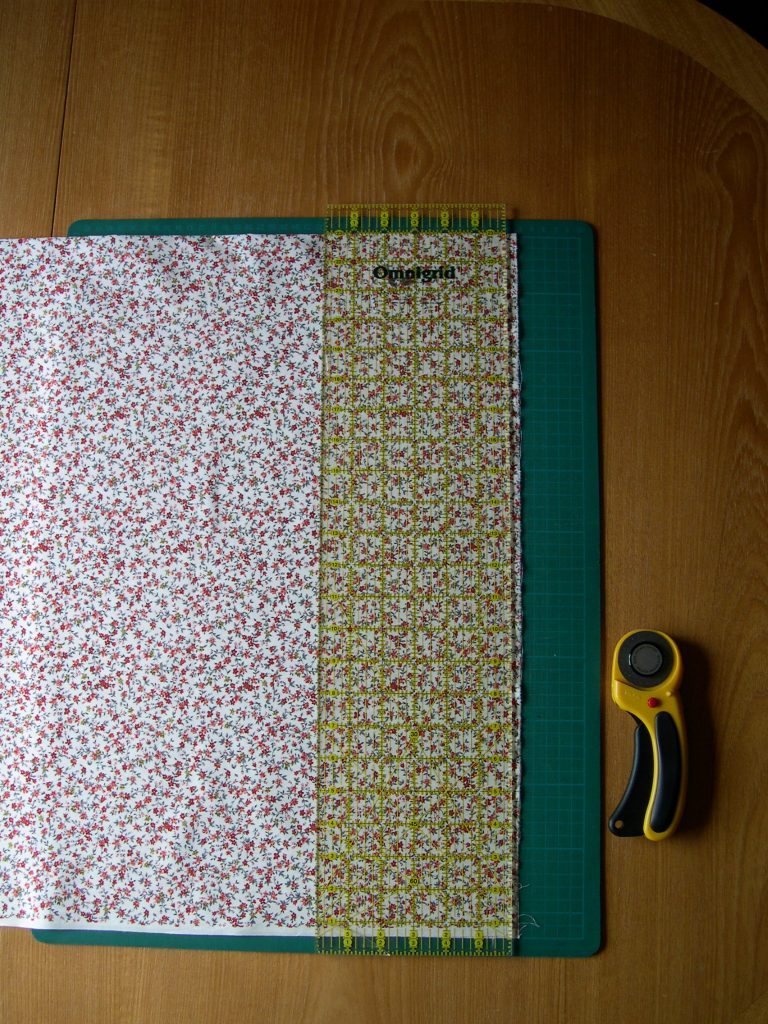 Fabric on cutting mat with quilters ruler
